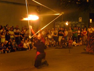 The diabolical-looking performer was manipulating the flame within this triangle.