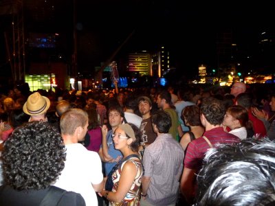 The people were reveling in the party atmosphere and enjoying the music.