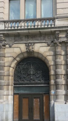 Intricate doorway of La Patrie building off of St. Catherine Street in Montral.