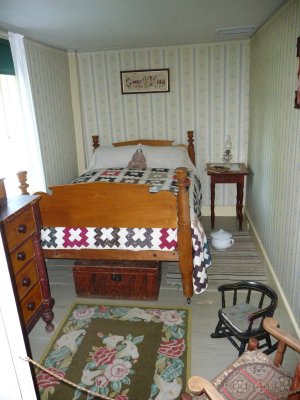 The small narrow shed bedroom. Calvin learned to make quilts when he was a boy.