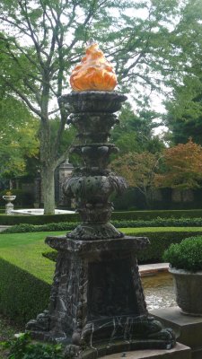 One of several elaborately-carved lamps in front of the Kykuit mansion.