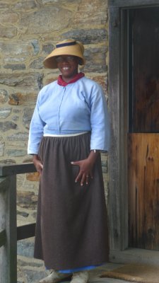 Close-up of the costumed lady dressed in 18th century clothing.