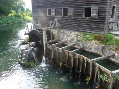 The Philipses had to dam up the river to construct the flume that directs the water towards the mill.