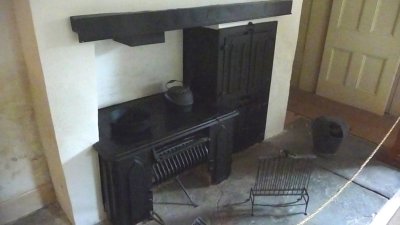 The Kitchen had the most modern appliances of its day, with a coal burning stove, a hand-operated pump and running water.