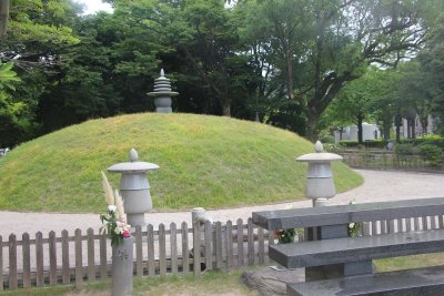 The Atomic Bomb Memorial Mound is a grass-covered knoll that contains the ashes of 70,000 unidentified victims of the bomb.