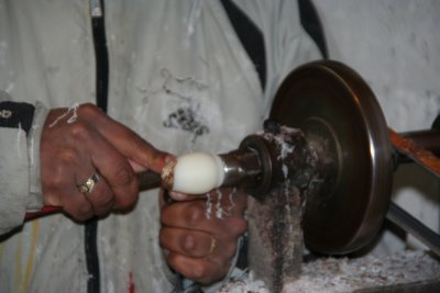 Close-up of tagua seed carving in process.