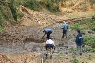 The train made an unscheduled stop, because of a mudslide that made the tracks impassable.