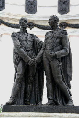 Since Simon Bolivar (on the left) was so short, the sculptor made him much taller so he would equal St. Martin's stature!