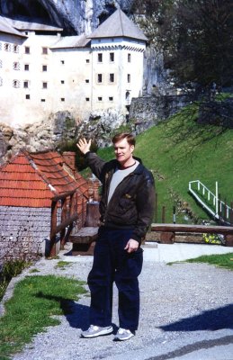 Me pointing to Predjamski Castle.