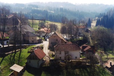 A bucolic shot of the town of Predjama as seen from Predjamski Castle.