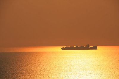 Ship on a golden sea