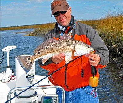 Rich with a January Coldlwater Redfish with 9 spots