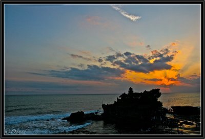 Sunset on the rocky temple of Tanah Lot.