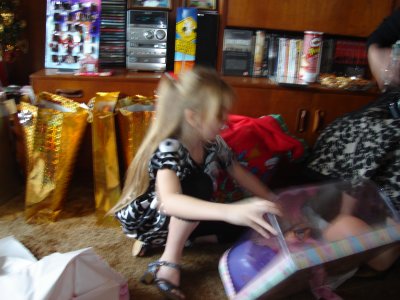 Becky opening pressies too fast for the camera.JPG