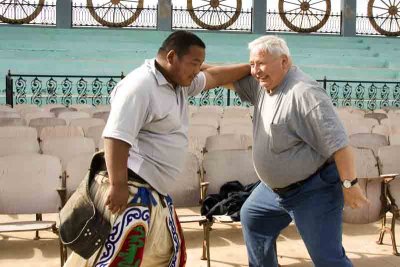 Expatriate receiving greeting from Mongolian greeter