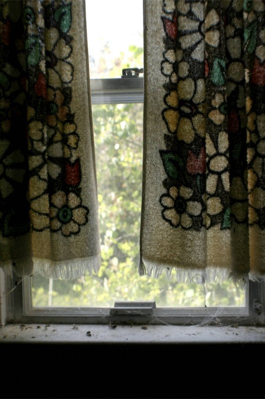 Old curtains still hanging....