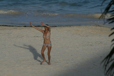 Girl enjoying the sun and sand