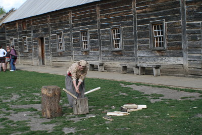 1800's woman chopping wood