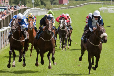 Tally Close and Paul Hanagan (far right) winning the Eu breeders fund Maiden Stakes