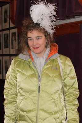 Beverly Galpin gets into the holiday spirit before goes into the cold to sing carols.