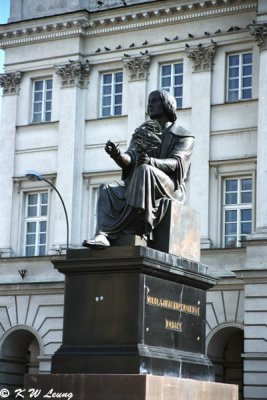 The monument of Nicolaus Copernicus stands in front of Staszic Palace