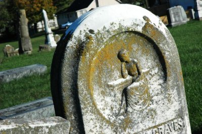 girl sitting headstone.jpg