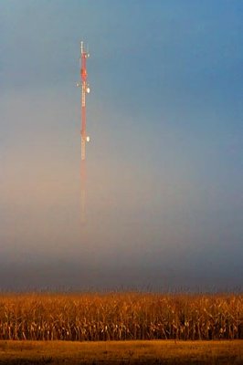 Communications Tower Rising Out Of Fog 22810