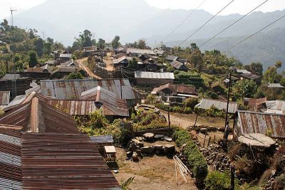 Peren Village - like all the villages in southern and central Nagaland - nearly all the houses have got tin roofs.