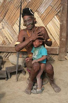 Headhunter consoling his little great-grandson.