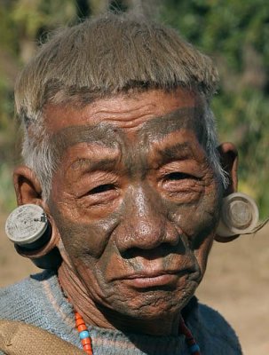 Konyak Naga with tattoos of a successful headhunter in Shangnyu.