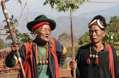 Former headhunters singing old war songs in Shangnyu.