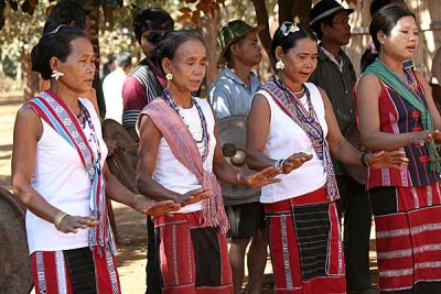 Kreung women sing and dance. A celebration at the beginning of the harvest season.