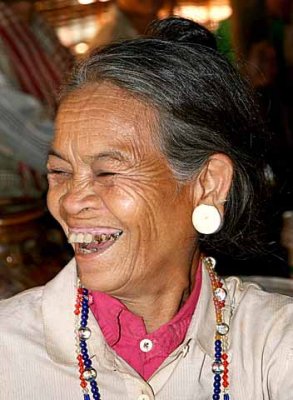 Happy Kreung lady during the pre-harvest celebration.