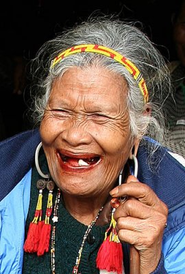 Old Phnong lady with traditional earrings. Pu Tang Village, Mondulkiri, Cambodia