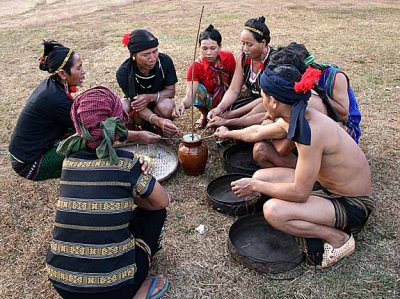 Phnong people speaking a prayer before starting a ceremony. Pu Tang Village, Mondulkiri, Cambodia