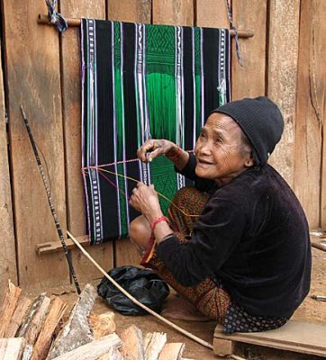 Phnong lady weaving a traditional cloth. Dak Dam Village, Mondulkiri, Cambodia