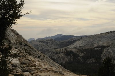 Smoke rising behind Half Dome and Clouds Rest