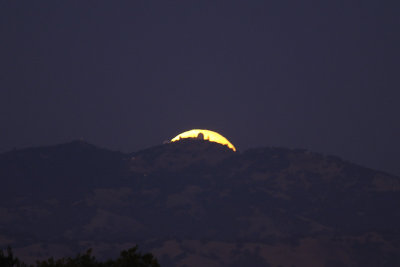 The Just Past Harvest Moon rising behind Mount Hamilton/Lick Observatory