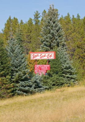 zP1060195 SSE sign by main entrance on Highway 2 near Glacier National Park.jpg