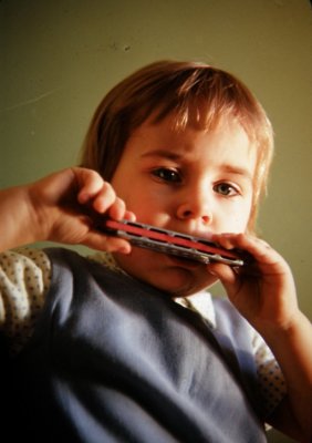 CANDID:  The Harmonica Girl