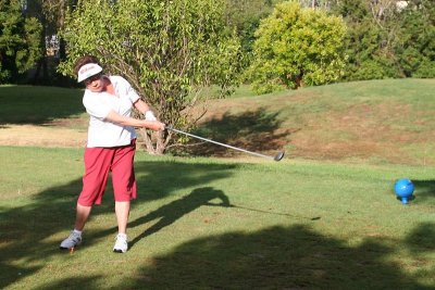 paula tees off
