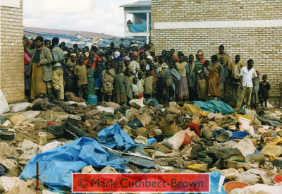 View of the entrance to the hospital complex showing displaced persons who had refused to vacate and who remained surrounded by the Rwandan Patriotic Army.