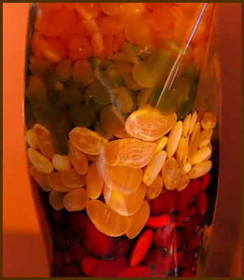 NUTS AND FRUIT IN GLASS CANISTER