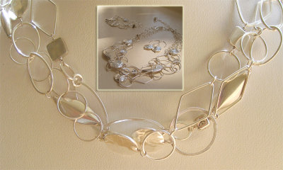 sterling silver necklace, bracelet and earrings