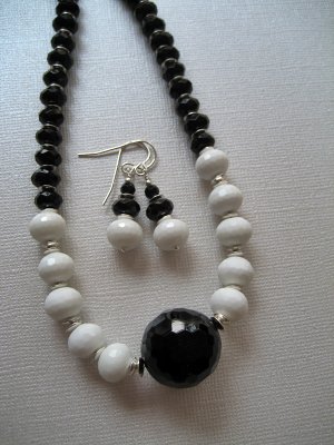 Faceted black onyx, faceted white jade and sterling silver necklace and earrings