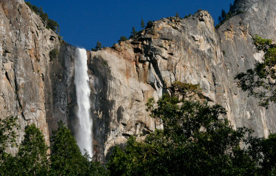 UPPER YOSEMITE FALLS FROM VALLEY FLOOR YOSEMITE NATIONAL PARK