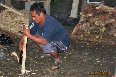 Omar chopping firewood