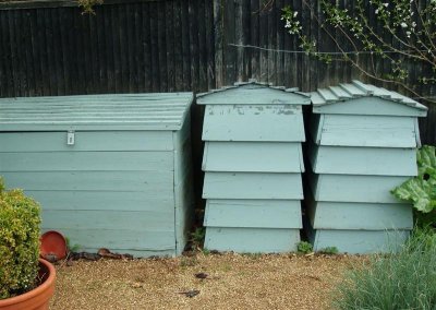 The tool store and compost bins