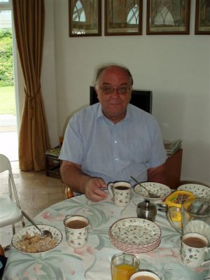 Finally a very rare photo of Chris at breakfast time and nearly smiling too