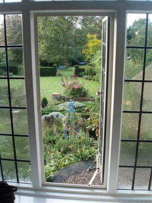 Gower Sibford garden thru window